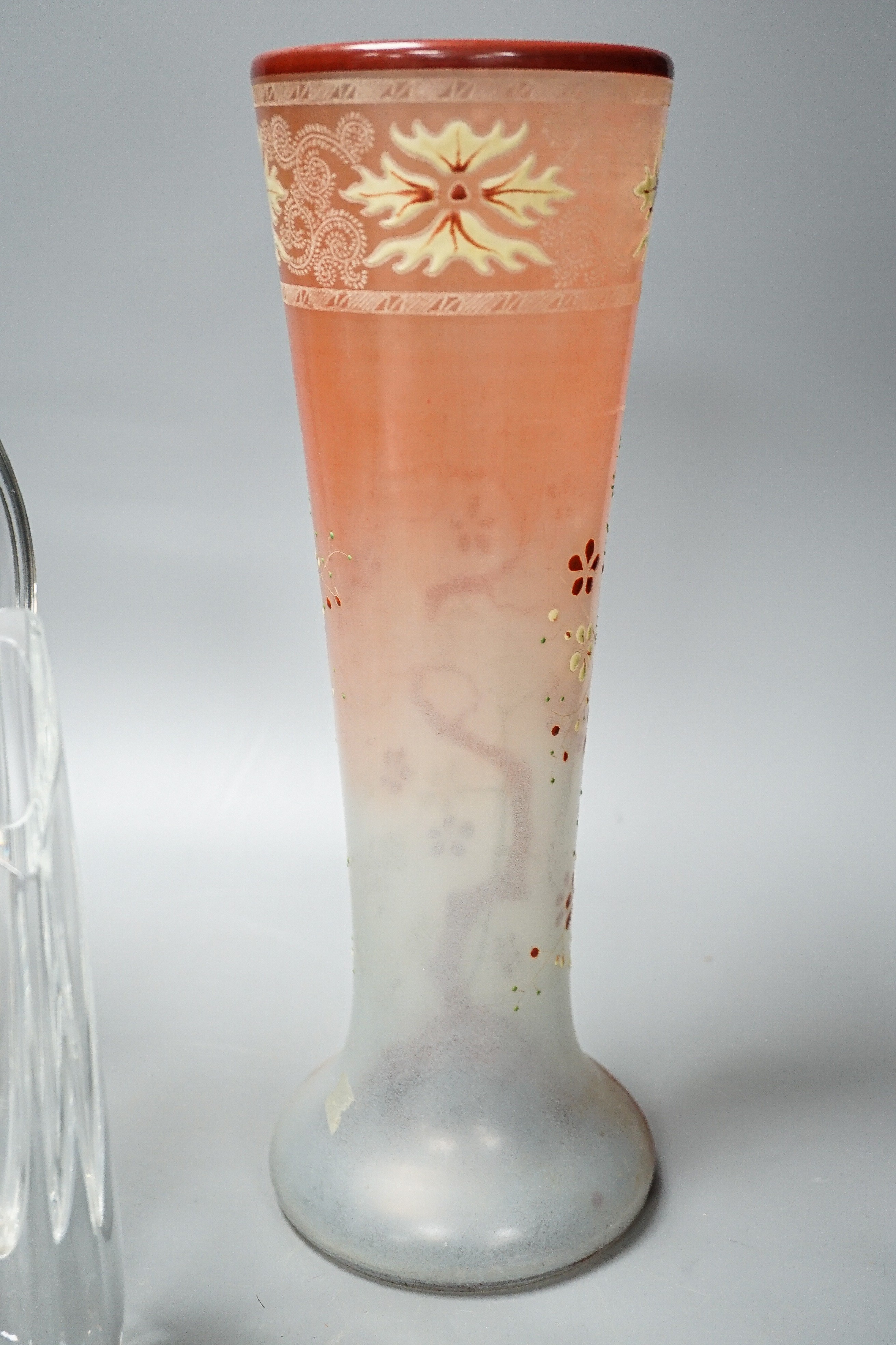 A tall Bohemian enamelled glass vase, 35cm, manner of Moser, a Moser heavy facet cut glass vase, 29.5cm, etched mark, and a Baccarat moulded glass vase (3)